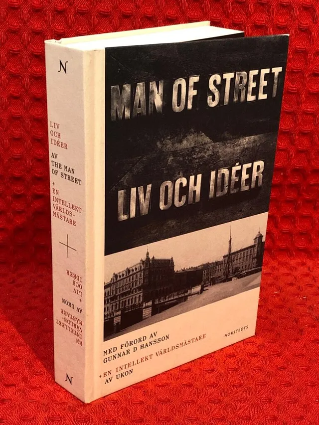 En intellekt världsmästare ; The man of street : liv och idéer av Ulf Karl Olov Nilsson - omslag