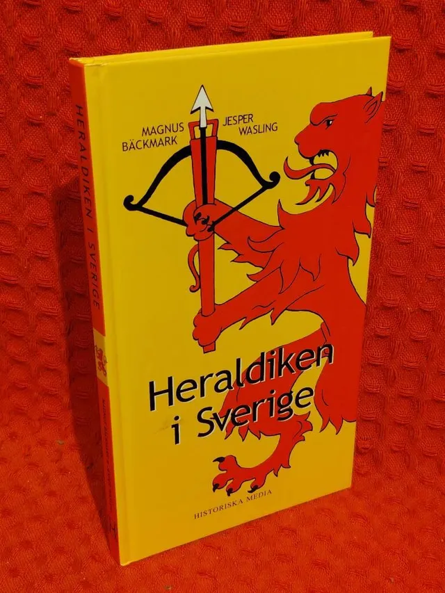 Heraldiken i Sverige av Magnus Bäckmark - omslag