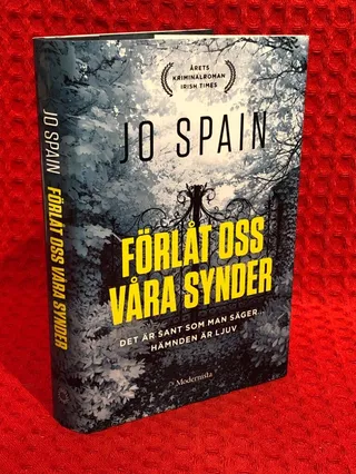 Förlåt oss våra synder av Jo Spain - omslag