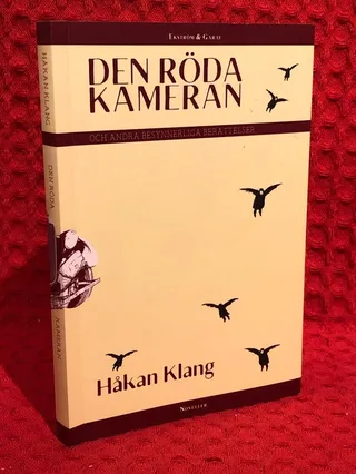 Den röda kameran : och andra besynnerliga berättelser av Håkan Klang - omslag