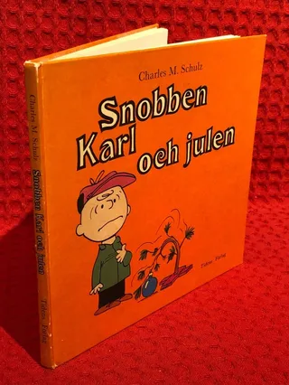 Snobben, Karl och julen av Charles M. Schulz - omslag