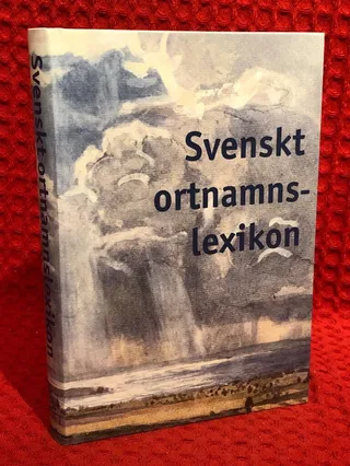Svenskt Ortnamnslexikon av Torsten Andersson - Eva Brylla - Lennart Hagåsen - Svan.. - omslag