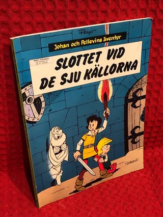 Slottet vid de sju källorna av Peyo - omslag