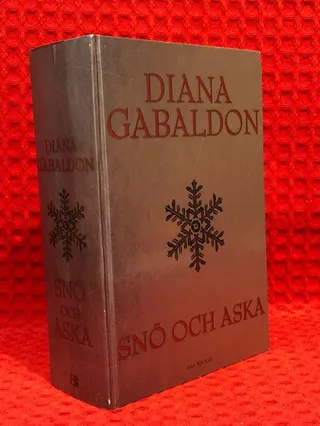 Snö och aska av Diana Gabaldon - omslag
