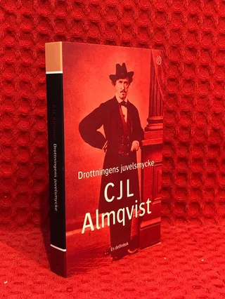 Drottningens juvelsmycke eller Azouras Lazuli Tintomara - berättelse om händelser näst före, under och efter konung Gustaf III:s mord : romaunt i tolv böcker av Carl Jonas Love Almqvist - omslag