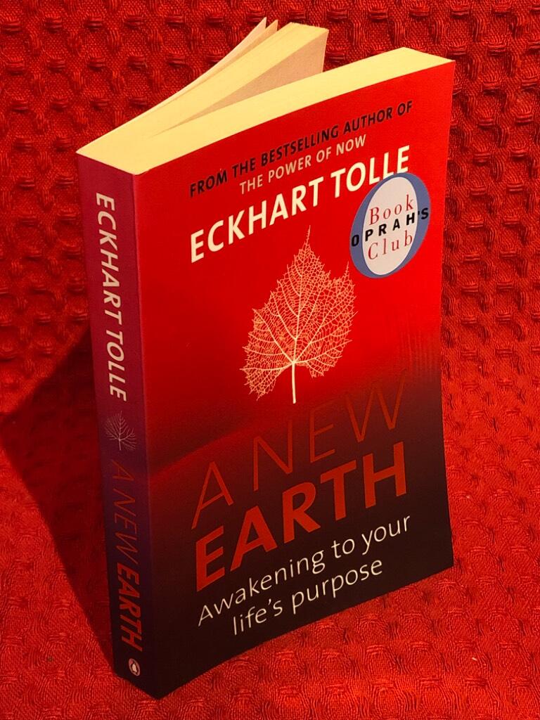 A new earth av Eckhart Tolle - omslag