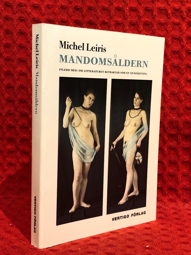 Mandomsåldern : inledd med: Om litteraturen betraktad som en tjurfäktning av Michel Leiris - omslag
