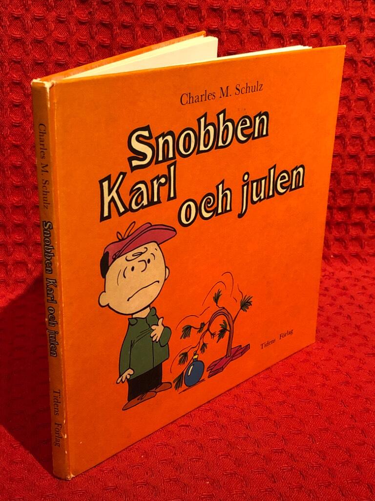Snobben, Karl och julen av Charles M. Schulz - omslag